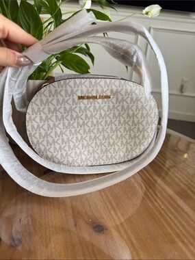Michael Kors Neutral Signature Oval Crossbody in Vanilla Pattern
